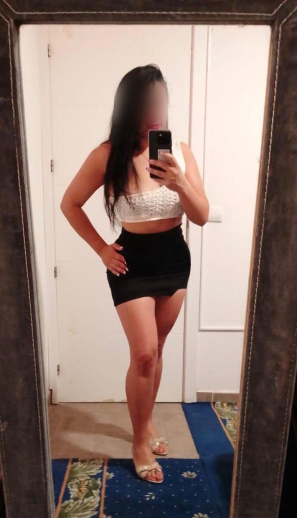 Complaciente colombiana por palma