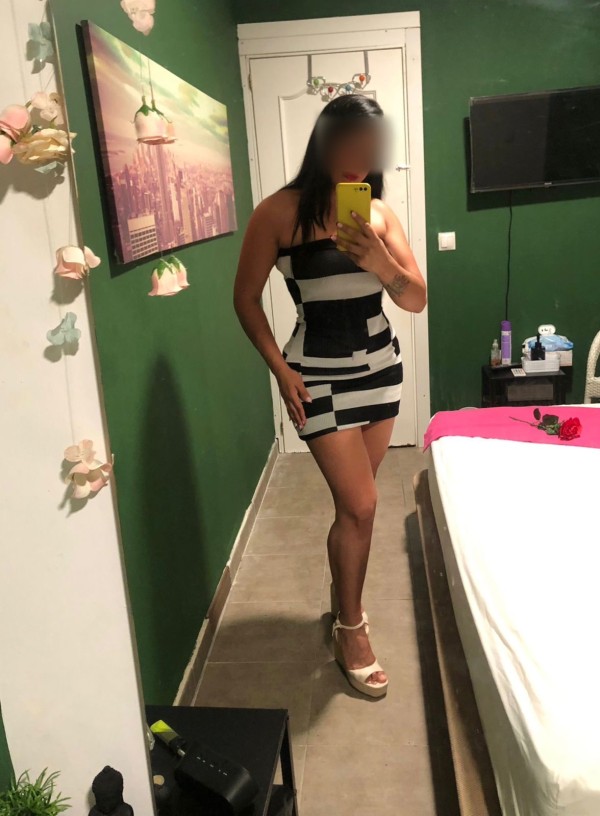 Complaciente colombiana por palma