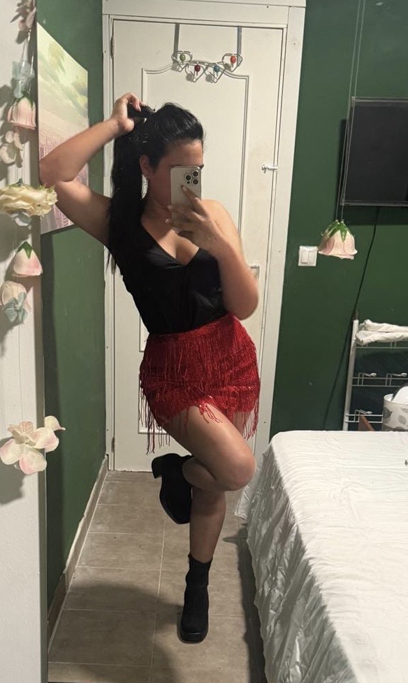 Complaciente colombiana por palma