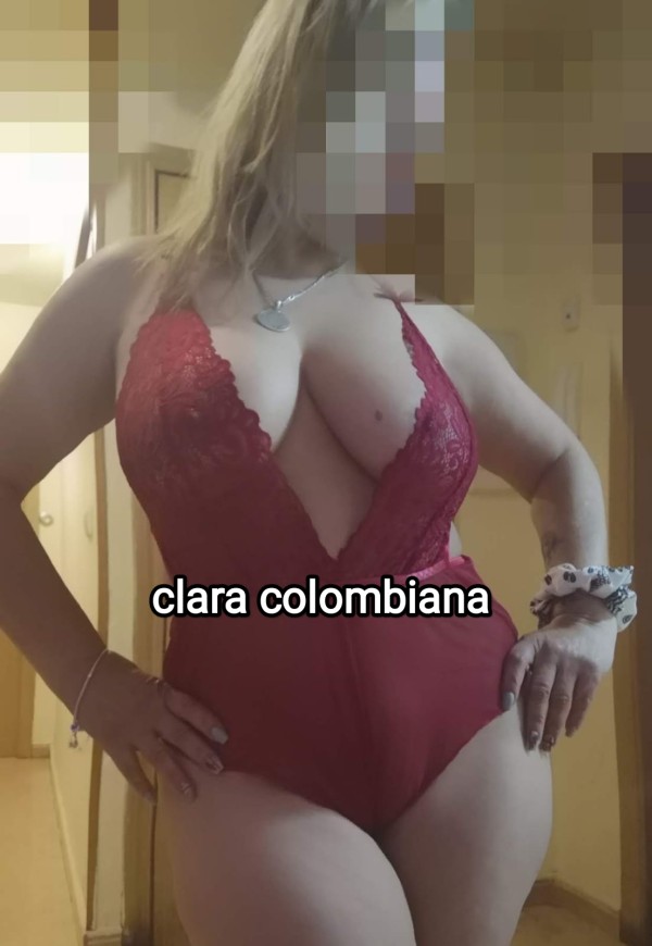 Exótica rubia sexy con curvas  clara madurita