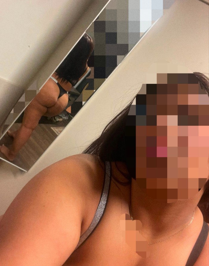 Very sexy young woman with curves and huge tits.
