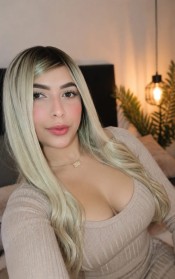 PAOLA SESUAL Y COMPLACIENTE